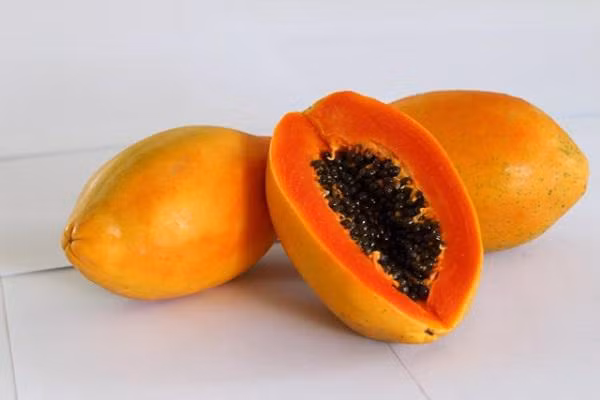 Chăm sóc tóc óng mượt giảm hư tổn hiệu quả từ đu đủ (Ảnh: Internet)