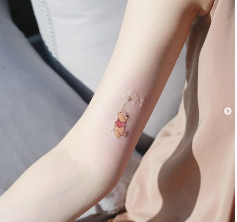 Hình xăm nhỏ dành cho những bạn thích gấu pooh.