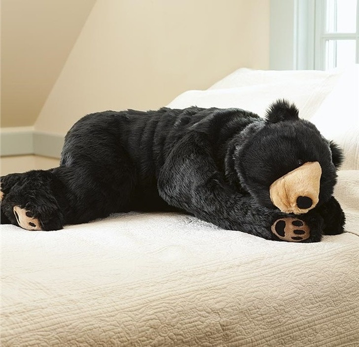 Gối ôm ngủ hình con gấu êm ái hỗ trợ giấc ngủ.