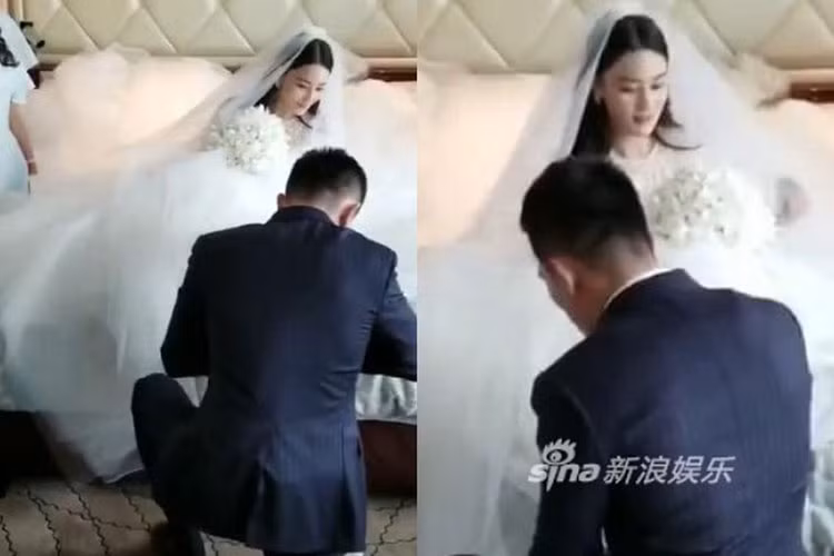 Trong đám cưới, ông xã của Trương Hinh Dư có hành động xỏ giày giúp vợ khiến fan ghen tỵ với nữ diễn viên.
