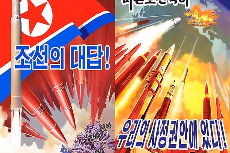 Trong đó nước Mỹ luôn là mục tiêu ưu thích của Triều Tiên và Washington phải bị tiêu diệt bằng mọi giá. Trong ảnh là hàng chục quả tên lửa Triều Tiên được bắn vào nước Mỹ được vẽ trên một tấm tranh cổ động. Nguồn ảnh: sbs.com.au