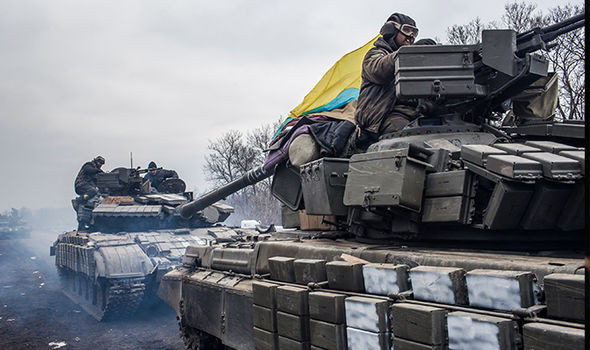 Xung đột vẫn âm ỉ tại miền Đông Ukraine. Ảnh: Daily Express