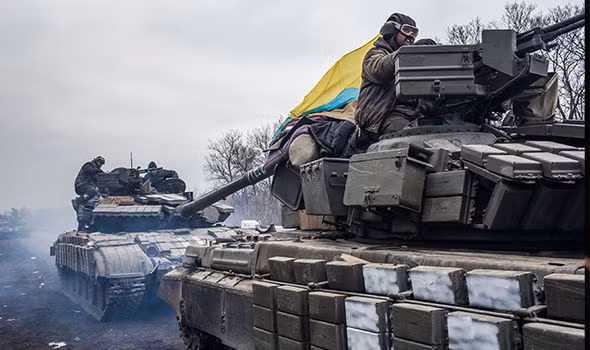 Xung đột vẫn âm ỉ tại miền Đông Ukraine. Ảnh: Daily Express