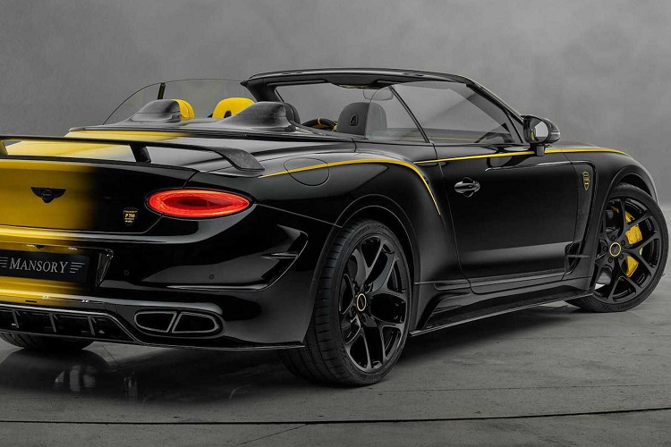 Ở ngoại thất, khoảng ¼ xe Vitesse Continental GTC độ Mansory được sơn màu đen theo chiều dọc, ở giữa là đường chuyển màu nhẹ tạo hiệu ứng. Phần còn lại được sơn màu vàng nổi bật.