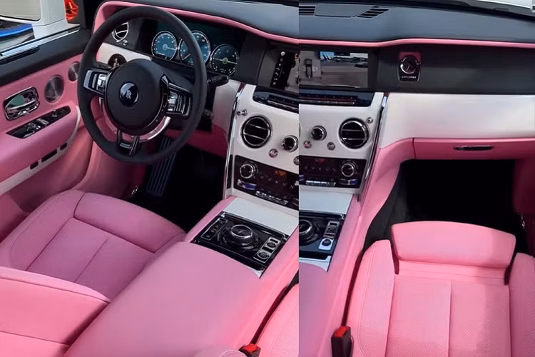 Ẩn sau vỏ bọc của một chiếc Cullinan đạo mạo màu trắng ngà bên ngoài, khoang nội thất - không gian riêng tư vốn chỉ dành để phục vụ chủ nhân - của chiếc Rolls-Royce Cullinan độ Platinum Motorsport tự do sáng tạo. Và kết quả là chúng ta được chứng kiến một chiếc Cullinan với khoang nội thất bọc da màu hồng pastel - tone màu "cute hột me" vốn thường đại diện cho lứa tuổi học trò ngây thơ tươi sáng!!!