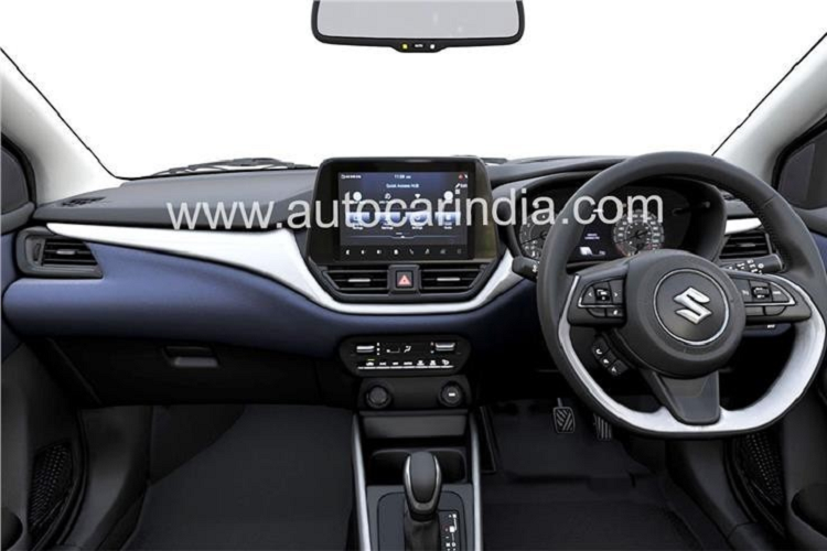 Tương tự ngoại thất, nội thất của Suzuki Baleno 2022 cũng được nâng cấp đáng kể với mặt táp-lô thiết kế 3 tầng hoàn toàn mới. Tầng trên cùng được sơn màu đen và trông khá giống với Suzuki S-Cross thế hệ mới. Tiếp đến là tầng giữa màu bạc làm điểm nhấn, bao quanh cửa gió điều hòa trung tâm và kéo dài sang hai bên cột A. Trong khi đó, tầng cuối cùng màu xanh đậm giống mặt cửa.