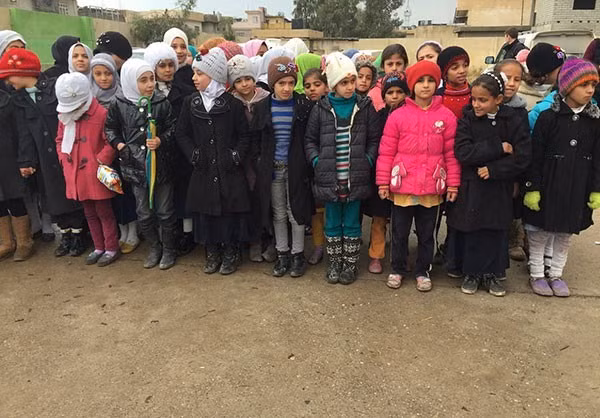 Anh: Hoc sinh Iraq no nuc di hoc o thanh pho Mosul-Hinh-2