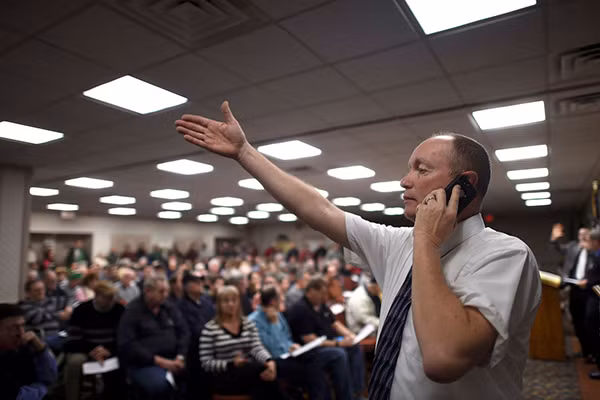 Frank Coleman điều hành phiên đấu giá ở Viện bảo tàng Hall of Presidents hôm 14/1.