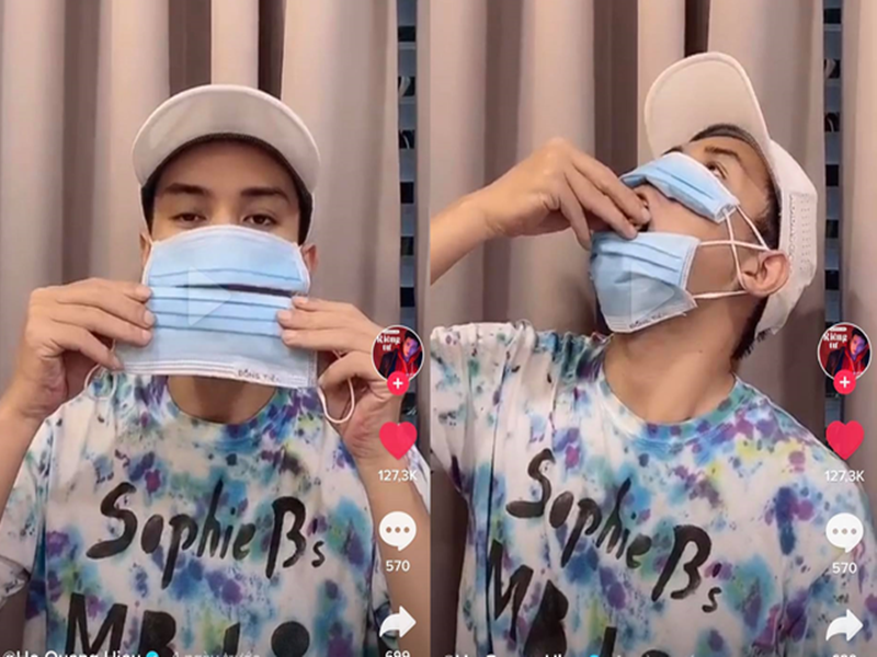 Năm 2020, Hồ Quang Hiếu đăng tải clip đeo 2 chiếc khẩu trang, 1 chiếc ở phía trên mũi, chiếc còn lại ở dưới phần miệng và cằm. “Ra đường khẩu trang này cho tiện luôn, khỏi cởi", nam ca sĩ nói về cách đeo khẩu trang này. Nhiều cư dân mạng chỉ trích nam ca sĩ đeo sai khẩu trang và lãng phí. Ảnh: Hoa Học Trò.