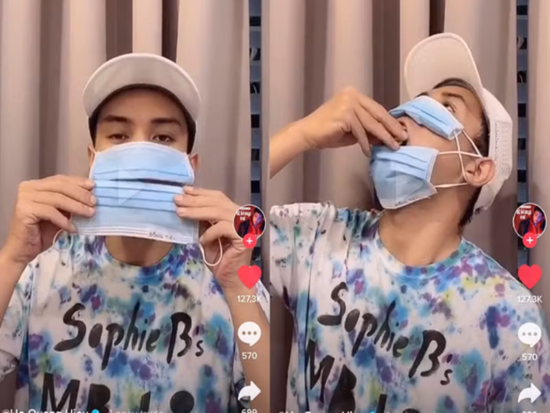 Năm 2020, Hồ Quang Hiếu đăng tải clip đeo 2 chiếc khẩu trang, 1 chiếc ở phía trên mũi, chiếc còn lại ở dưới phần miệng và cằm. “Ra đường khẩu trang này cho tiện luôn, khỏi cởi", nam ca sĩ nói về cách đeo khẩu trang này. Nhiều cư dân mạng chỉ trích nam ca sĩ đeo sai khẩu trang và lãng phí. Ảnh: Hoa Học Trò.