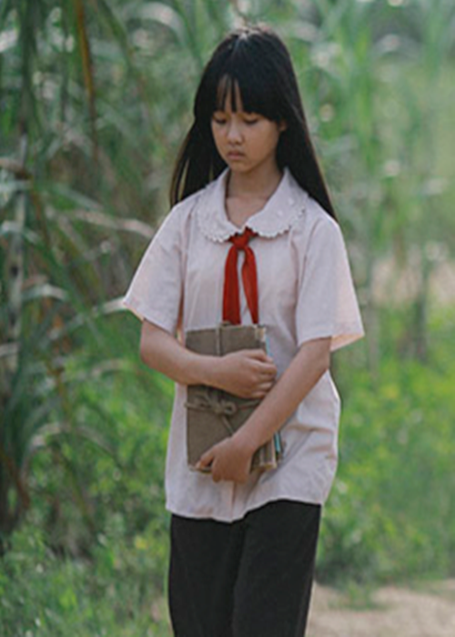 Thanh Mỹ nổi tiếng hơn nhờ vai Mận trong phim điện ảnh Tôi thấy hoa vàng trên cỏ xanh ra mắt vào năm 2015. Ảnh: Zing.