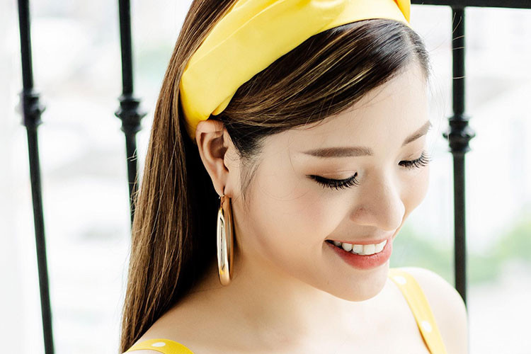 Người đẹp sinh năm 1990 thi chui Hoa hậu Du lịch Quốc tế 2013 nên bị bị phạt hành chính 15 triệu.