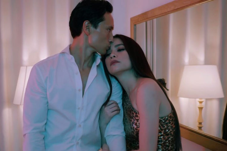 Từ khi gắn bó, Kim Lý hết lòng chiều chuộng Hà Hồ. Anh thường xuyên tháp tùng cô đi diễn, đóng MV của bạn gái. Ảnh: VTC