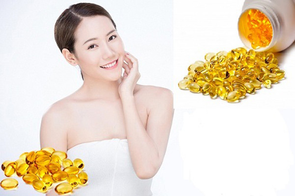 Lợi ích thoa vitamin E lên mặt. Thoa vitamin E lên mặt giúp bảo vệ các tế bào, tránh tổn thương do tia UV gây ra. Đồng thời, dưỡng chất cũng mang lại tác dụng ngăn ngừa lão hóa da, giảm nếp nhăn.