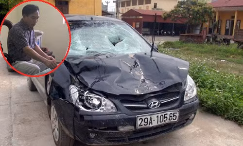 Chủ tịch xã Trung Nghĩa và chiếc xe ô tô gây tai nạn.