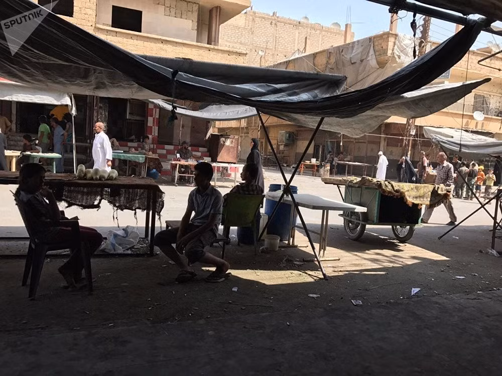 Một khu chợ hoạt động trở lại ở thành phố Deir Ezzor. Ảnh: Sputnik. Ảnh: Sputnik.