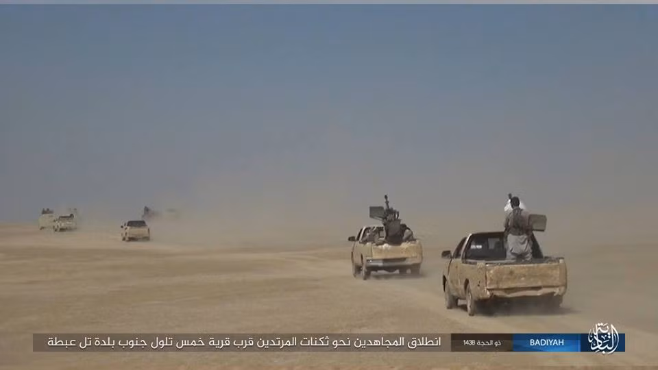 Anh: Khung bo IS tan cong du doi dan quan Iraq-Hinh-2