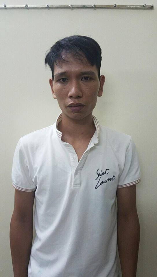 Trần Văn Phong tại cơ quan công an.