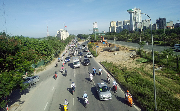 Ha Noi nang nhu do lua: Nguoi “hot” bac trieu, nguoi “meo mat” vi e