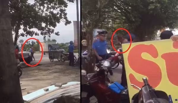 Nguoi dan ong cam dao gianh bien quang cao voi thanh tra giao thong HN