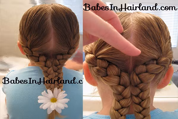 Kiểu tết tóc đuôi cá. Mẹ chia tóc làm đôi và tết hai bên tóc bình thường, có thể tết 3,4 tùy ý. Sau đó thì dùng kim băng để cố định 2 lọn tóc đã tết vào với nhau, Cuối cùng, buộc túm đuôi tóc và gắn thêm 1 bông hoa nhỏ dễ thương cho bé.