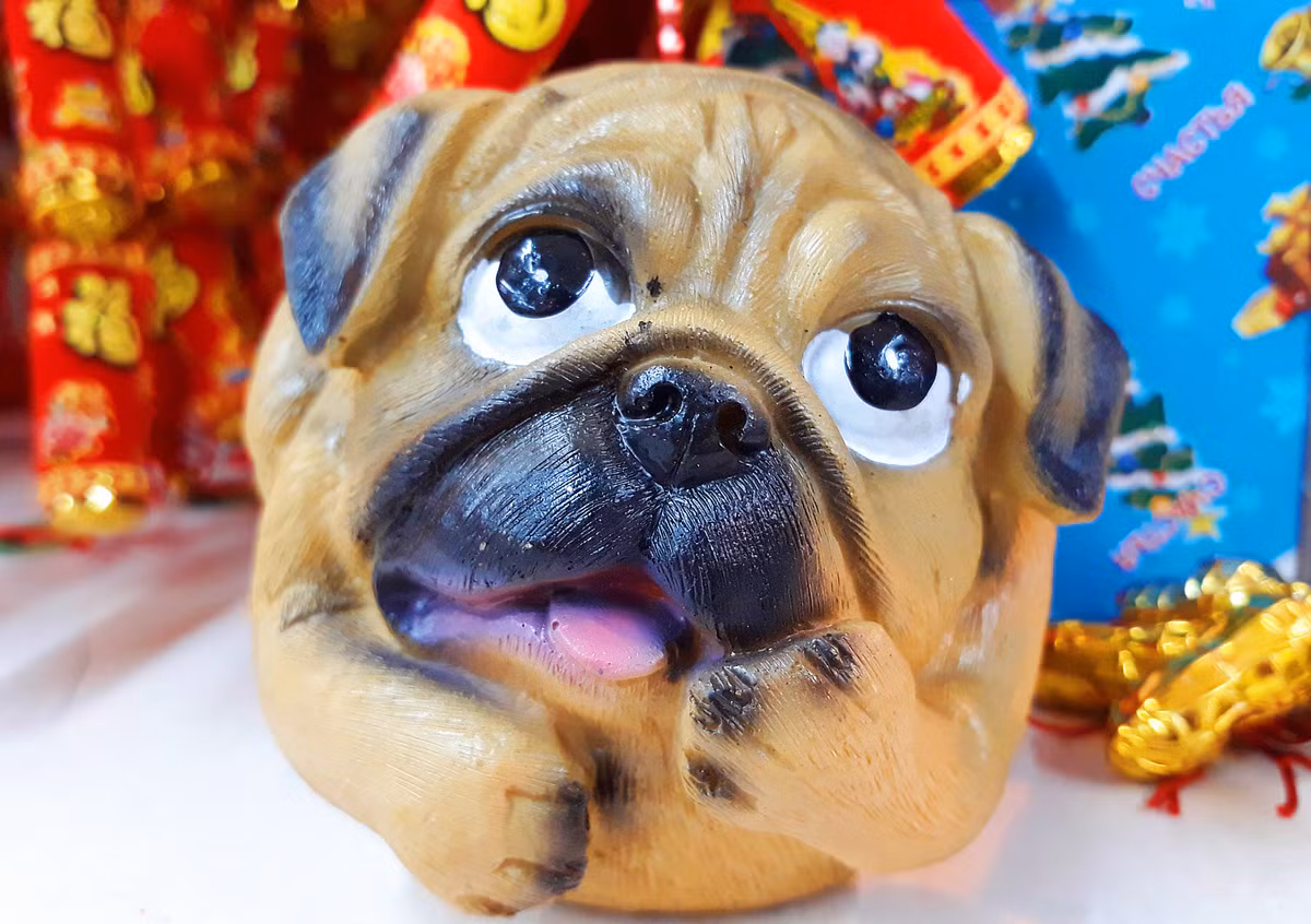 Một chú cún gỗ giữ tiền siêu đáng yêu.