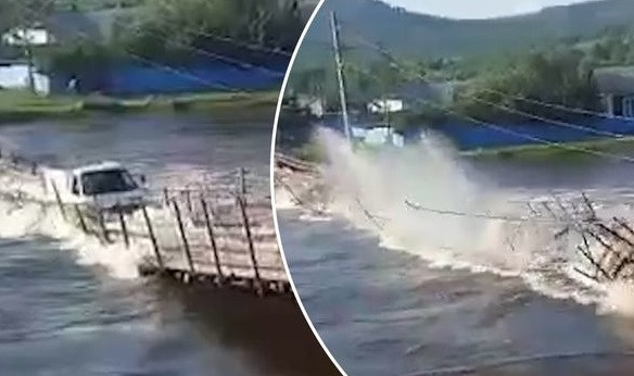 Video: Xe tải chìm nghỉm giữa sông khi băng qua cây cầu gỗ Video: Xe tai chim nghim giua song khi bang qua cay cau go