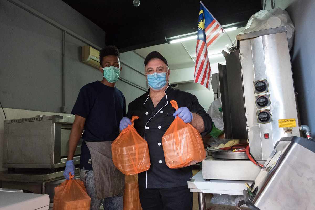 Tan muc cuoc song nguoi ti nan o Malaysia giua mua dich COVID-19-Hinh-5