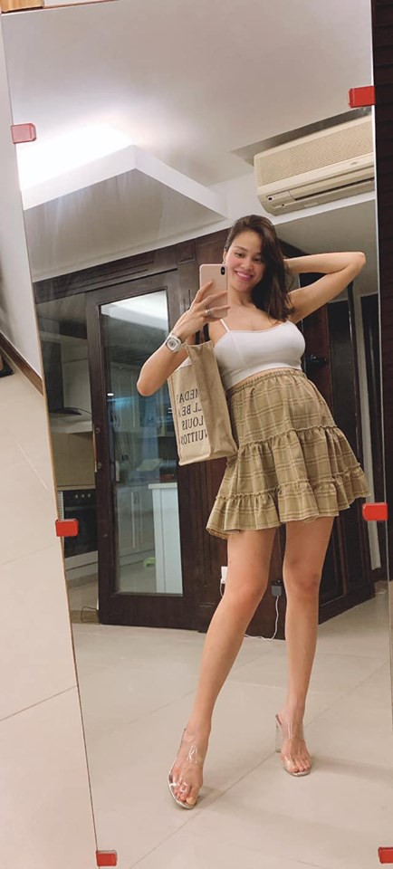 Bau vuot mat, Phuong Mai van di giay sieu cao, dien ao khoe eo