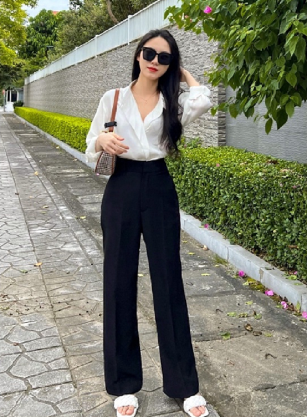 Quần ống đứng. Quần ống đứng mang tới hiệu ứng thị giác người mặc cao, đùi nhỏ và cân đối hơn. Để phát huy khả năng tôn dáng, giúp chân thẳng tối đa, bạn nên chọn quần màu tối, có khả năng ôm sát vùng mông. (Ảnh minh họa)