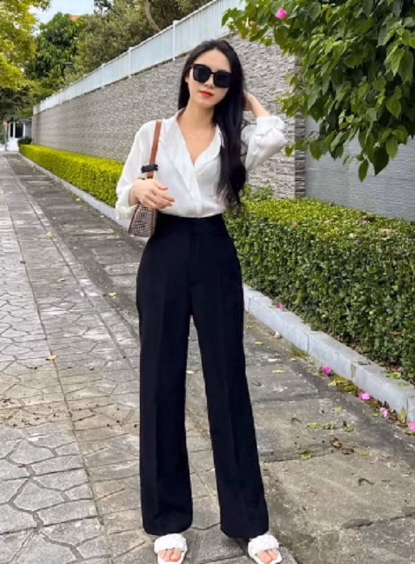 Quần ống đứng. Quần ống đứng mang tới hiệu ứng thị giác người mặc cao, đùi nhỏ và cân đối hơn. Để phát huy khả năng tôn dáng, giúp chân thẳng tối đa, bạn nên chọn quần màu tối, có khả năng ôm sát vùng mông. (Ảnh minh họa)