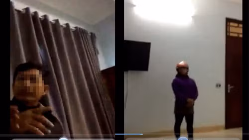 Người trong ảnh được cho là ông Th. và một người phụ nữ trong nhà nghỉ. Ảnh cắt từ clip