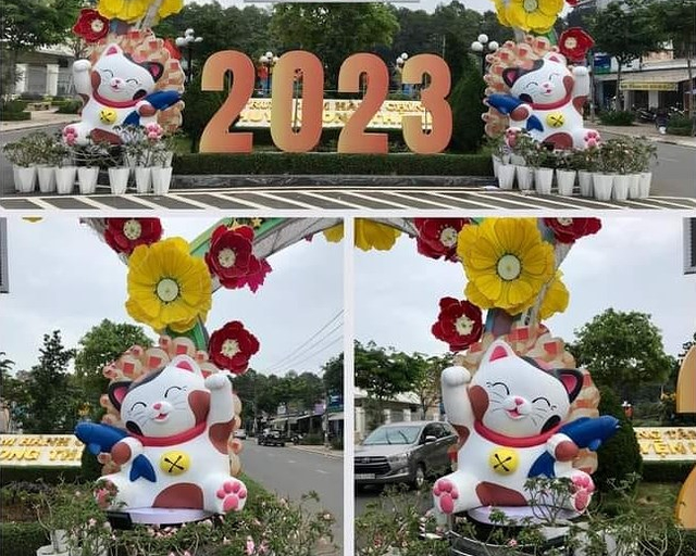 Hai chú mèo linh vật 2023 tại huyện Long Thành, tỉnh Đồng Nai có vẻ ngoài không quá cầu kỳ, nhưng vẫn toát lên vẻ dễ thương, xinh xắn. Đôi tay "măng cụt" đang vẫy chào và miệng cười chúm chím của chú mèo này thật ngộ nghĩnh, đáng yêu.