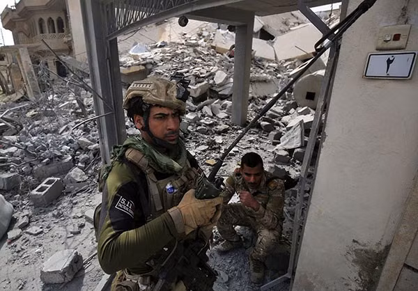 Các thành viên tham gia lần tấn công này được cho là thuộc biên chế Sư đoàn thiết giáp 9, quân đội Iraq. Ảnh FNA