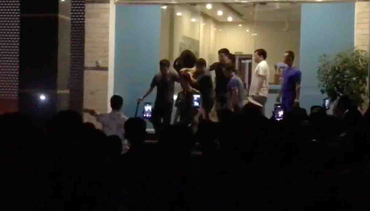 Nghi phạm được công an đưa về trụ sở