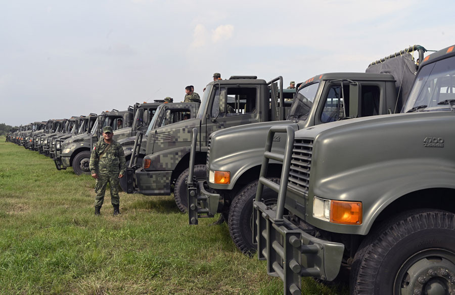 Thành viên của lực lượng Vệ binh Quốc gia Mexico với dàn phương tiện ở biên giới giữa nước này với Guatemala. Nguồn ảnh: Theatlantic.