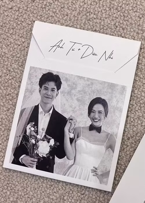 Bộ ảnh cưới của Diệu Nhi - Anh Tú đầy thú vị. Anh Tú mặc vest đeo khăn voan cô dâu, Diệu Nhi mặc váy trắng, cổ thắt nơ lịch lãm. Ảnh: Đại đoàn kết