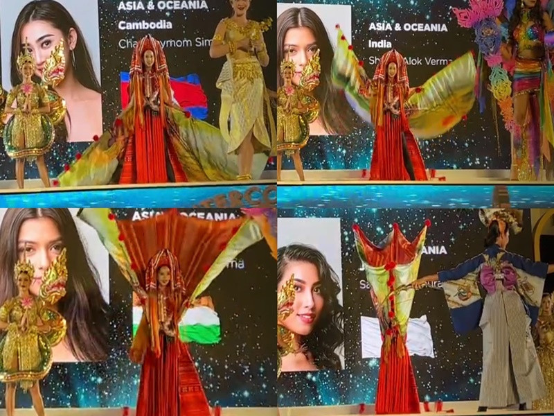 Đại diện Việt Nam diện thiết kế “Cô em Dao đỏ” trong phần thi Trang phục dân tộc. Do cổng ra sân khấu khá nhỏ nên chiếc cánh bộ trang phục bị rơi lúc Bảo Ngọc di chuyển ra sân khấu. Rất may, cuối cùng, cô cũng khắc phục được sự cố. Ảnh: FBNV