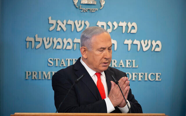 Phát biểu trên truyền hình, Thủ tướng Israel Benjamin Netanyahu thông báo lệnh phong tỏa "có thể kéo dài" sau thời hạn 3 tuần, tùy thuộc vào tình hình lây nhiễm dịch bệnh. Ảnh: AP.