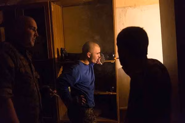 Little One (giữa) là thành viên trẻ nhất trong đơn vị tình nguyện. Vài ngày sau khi bức ảnh này được chụp, Litte One đã bị thương trong một cuộc giao tranh.