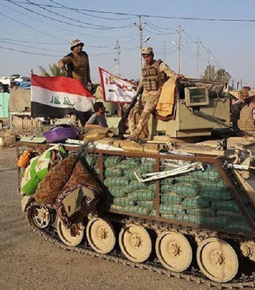 Lực lượng Iraq trên đường phố. Ảnh: FNA.