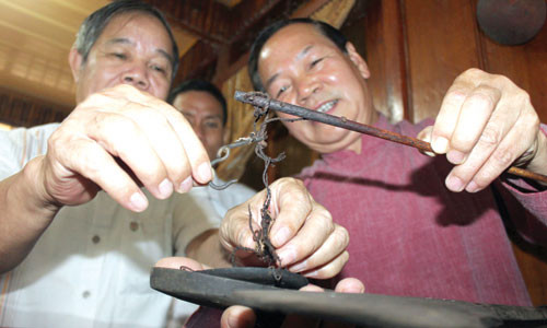 Nguoi “gom” co vat Muong