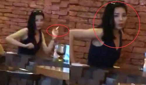 Hình ảnh phản cảm của đương kim HHVN 2014 khiến dư luận dậy sóng.