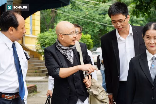 Nguoi phu nu kin tieng canh ong Dang Le Nguyen Vu trong vu ly hon nghin ty-Hinh-2