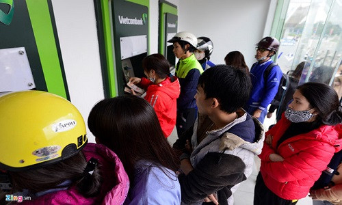 NHNN yeu cau giam han muc rut tien qua ATM vao dem khuya