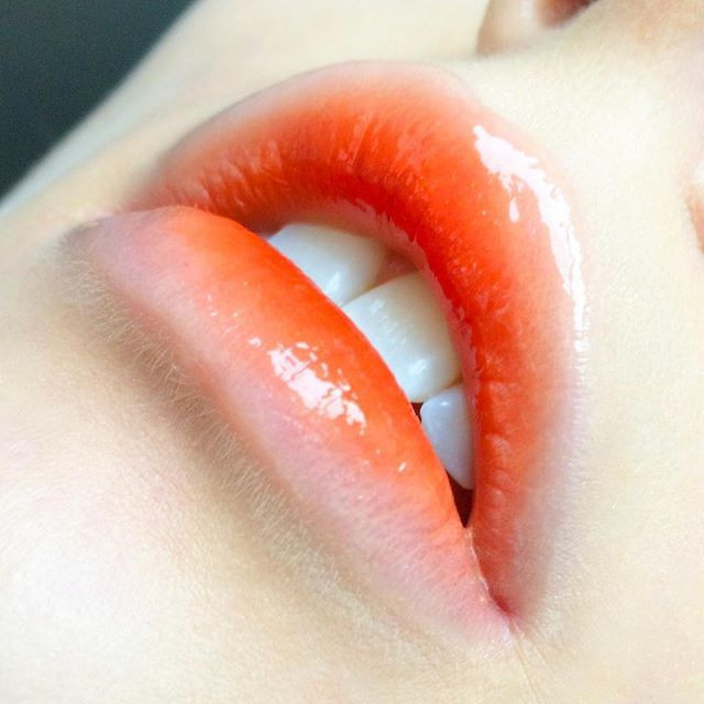 Make up với gam màu cam rực rỡ Sắc cam không chỉ ấm áp, dễ thương mà còn hợp với tông da trắng vàng châu Á, diện lên sẽ sáng bừng cả khuôn mặt. Ảnh minh họa: Internet 