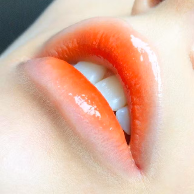 Make up với gam màu cam rực rỡ Sắc cam không chỉ ấm áp, dễ thương mà còn hợp với tông da trắng vàng châu Á, diện lên sẽ sáng bừng cả khuôn mặt. Ảnh minh họa: Internet 