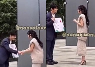 Khoảnh khắc Chi Pu bắt tay Huỳnh Hiểu Minh gây sốt. Ảnh: Weibo.