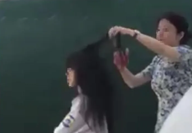 Vu co giao cat toc hoc sinh: So GD&DT Vinh Phuc thong tin gi?