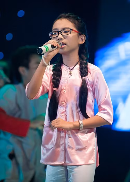 Sở hữu giọng hát ngọt ngào, Phương Mỹ Chi trở thành một hiện tượng của Giọng hát Việt nhí 2013. Ảnh: Dân Việt